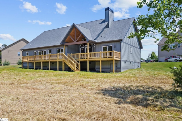 21 Old American Blvd, Pendleton, SC 29670 - back of property featuring a deck, a yard, a chimney, roof with shingles, and stairs