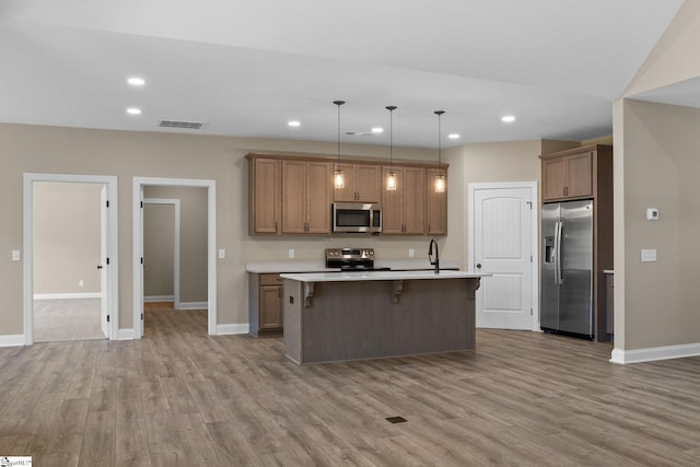 21 Old American Blvd, Pendleton, SC 29670 - kitchen featuring appliances with stainless steel finishes, light wood-style flooring, baseboards, recessed lighting, and light countertops