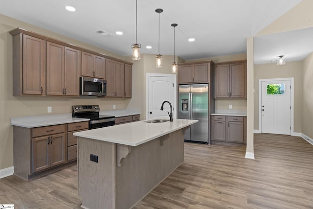 21 Old American Blvd, Pendleton, SC 29670 - kitchen with stainless steel appliances, a sink, baseboards, light wood-style floors, and recessed lighting