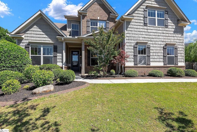 9 Sheldrake Pl, Simpsonville, SC 29681 - craftsman inspired home featuring a front lawn and brick siding