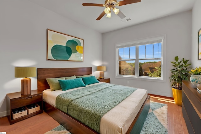 9 Sheldrake Pl, Simpsonville, SC 29681 - bedroom with wood finished floors, baseboards, and a ceiling fan