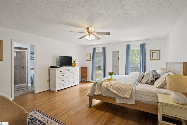 202 Shadow Oaks Dr, Easley, SC 29642 - bedroom with access to exterior, light wood-type flooring, a textured ceiling, and ceiling fan