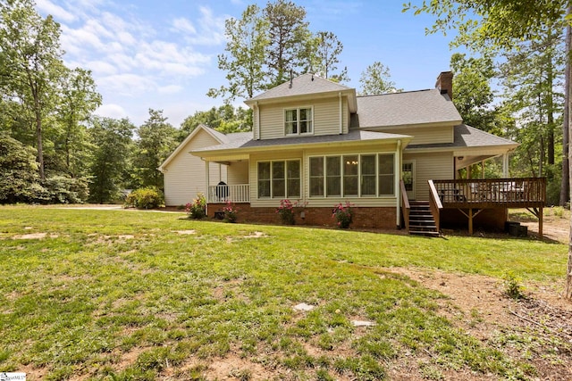 202 Shadow Oaks Dr, Easley, SC 29642 - rear view of house with a deck, a chimney, a sunroom, a yard, and a shingled roof