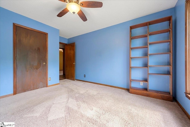 1606 Winding Way, Taylors, SC 29687 - unfurnished bedroom with carpet floors, baseboards, and a ceiling fan