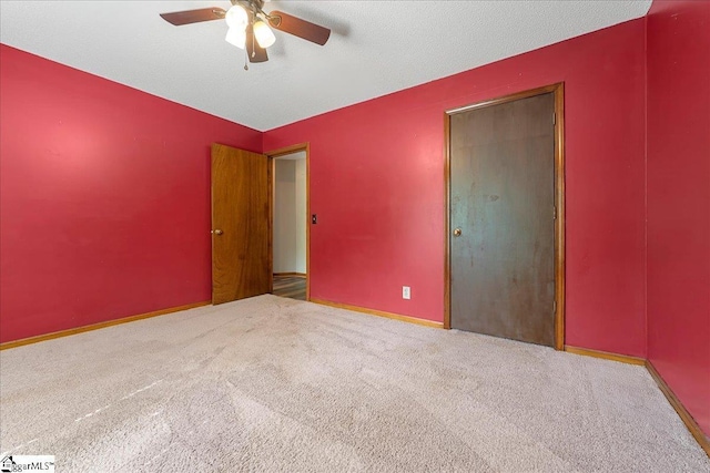1606 Winding Way, Taylors, SC 29687 - unfurnished bedroom featuring carpet floors, ceiling fan, and baseboards