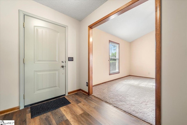 1606 Winding Way, Taylors, SC 29687 - entryway with wood finished floors, baseboards, and a textured ceiling