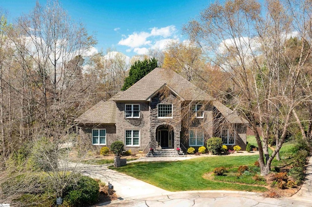 7 Collina Ct, Greenville, SC 29609 - view of front facade with a front yard and stone siding
