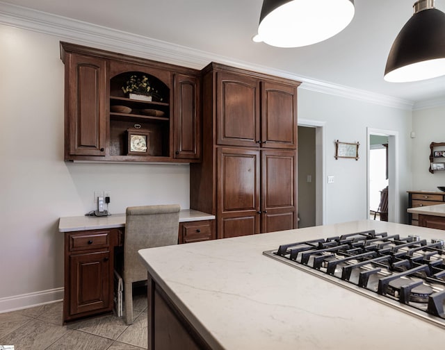 7 Collina Ct, Greenville, SC 29609 - kitchen with crown molding, stainless steel gas stovetop, baseboards, dark brown cabinets, and open shelves
