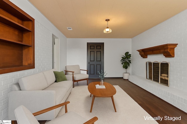 living area with dark wood-type flooring