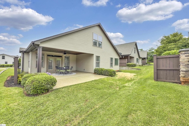 302 Owasso Dr, Greenville, SC 29615 - rear view of property with a yard, ceiling fan, and a patio area