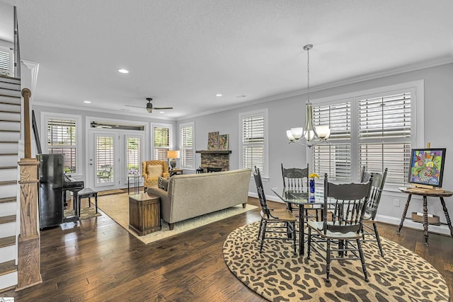 302 Owasso Dr, Greenville, SC 29615 - living area featuring stairway, a fireplace, crown molding, dark wood-type flooring, and recessed lighting