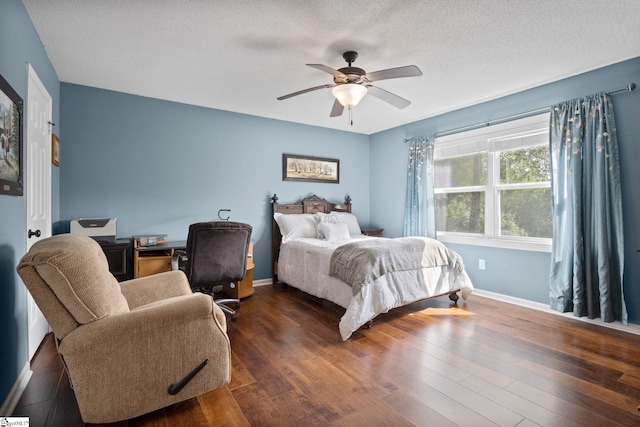 21 Pebble Creek Way, Taylors, SC 29687 - bedroom featuring wood finished floors, an office area, a textured ceiling, a ceiling fan, and baseboards