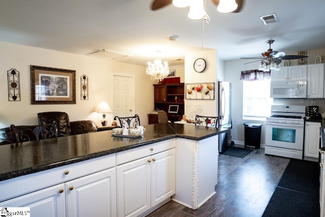 521 N Calhoun Shores Pkwy, Calhoun Falls, SC 29628 - kitchen featuring white appliances, a ceiling fan, white cabinetry, and dark countertops