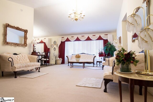 521 N Calhoun Shores Pkwy, Calhoun Falls, SC 29628 - living area featuring carpet floors, a chandelier, and vaulted ceiling