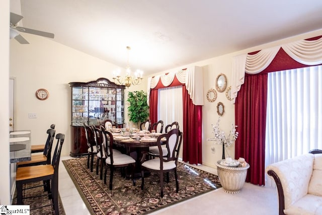 521 N Calhoun Shores Pkwy, Calhoun Falls, SC 29628 - dining space featuring a chandelier, vaulted ceiling, and a ceiling fan