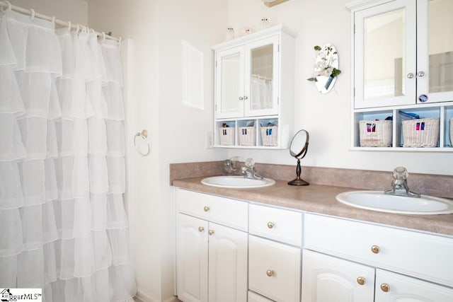 521 N Calhoun Shores Pkwy, Calhoun Falls, SC 29628 - bathroom with double vanity and curtained shower