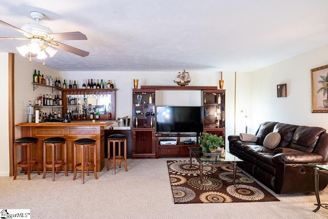 521 N Calhoun Shores Pkwy, Calhoun Falls, SC 29628 - living area featuring a dry bar, carpet, and a ceiling fan