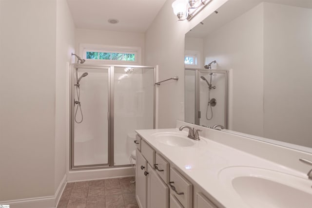 30 Kittery Dr, Greenville, SC 29615 - full bath with a shower stall, baseboards, and double vanity