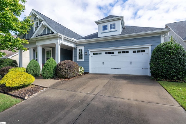 30 Kittery Dr, Greenville, SC 29615 - view of front of house featuring driveway, a garage, and a shingled roof