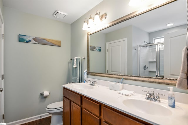 3 Wisner Ct, Simpsonville, SC 29681 - full bathroom featuring a stall shower, toilet, wood finished floors, double vanity, and baseboards