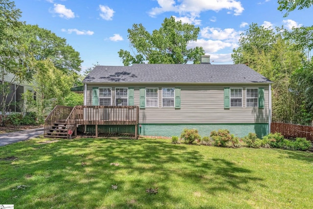 view of front of house with a wooden deck and a chimney