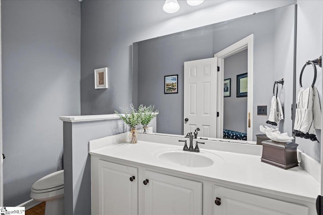 506 Neely Farm Dr, Simpsonville, SC 29680 - bathroom featuring vanity, toilet, and wood finished floors
