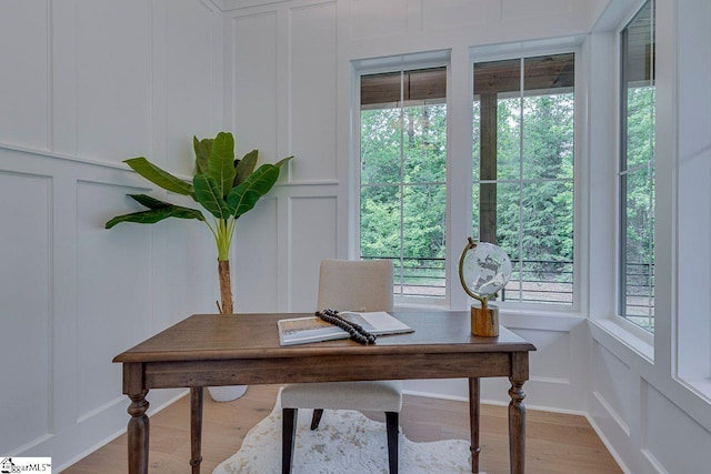 205 Fairview Dr, Greenville, SC 29609 - home office with a decorative wall and wood finished floors