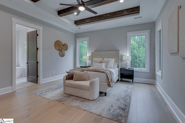 205 Fairview Dr, Greenville, SC 29609 - bedroom with wood finished floors, baseboards, beam ceiling, ensuite bathroom, and ceiling fan