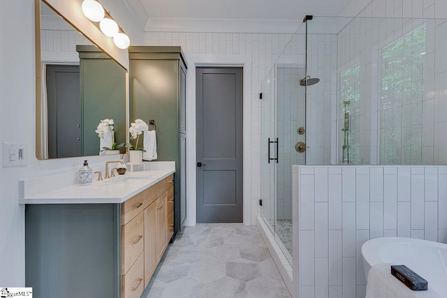 205 Fairview Dr, Greenville, SC 29609 - bathroom featuring crown molding, a shower stall, vanity, and a soaking tub