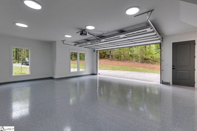 205 Fairview Dr, Greenville, SC 29609 - garage with a garage door opener and baseboards