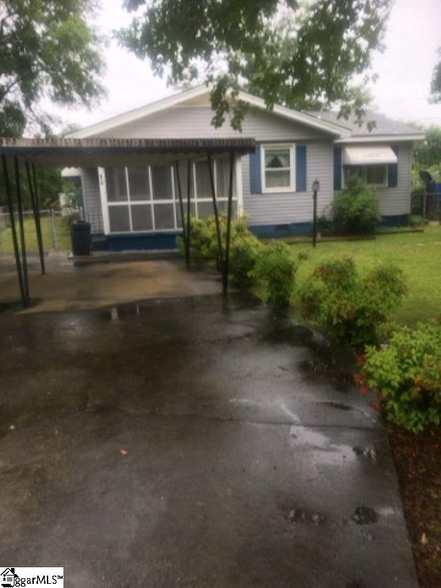 413 S Florida Ave, Greenville, SC 29611 - view of front of home with a front lawn and driveway