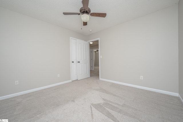 300 Stillwater Ct, Simpsonville, SC 29681 - empty room featuring light colored carpet, baseboards, ceiling fan, and a textured ceiling