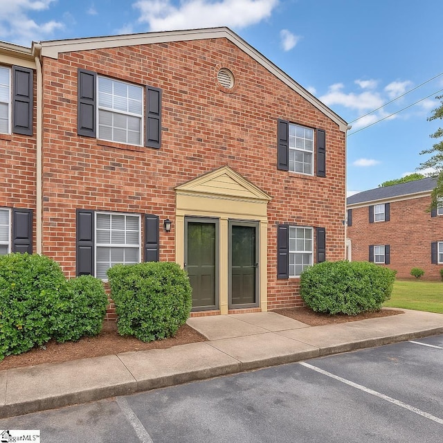 2530 E N St Unit 13K, Greenville, SC 29615 - view of front of property with brick siding and uncovered parking