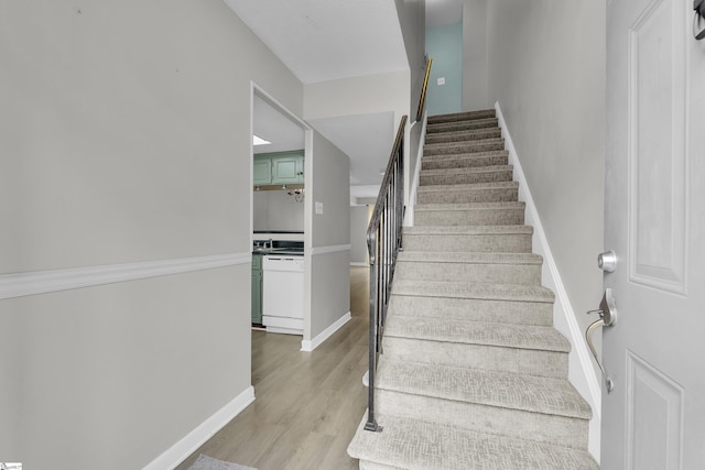 2530 E N St Unit 13K, Greenville, SC 29615 - stairs featuring wood finished floors and baseboards