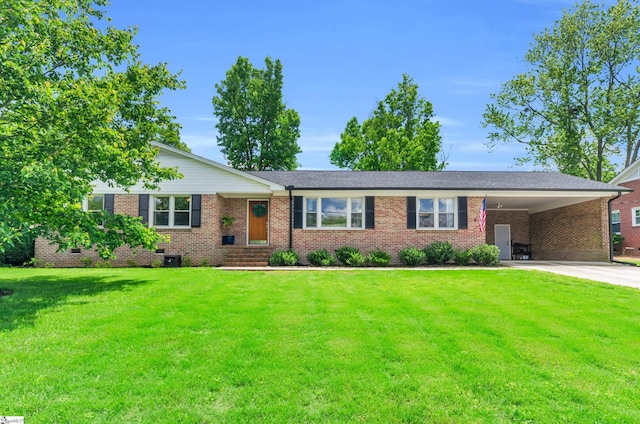 101 Kenilworth Ct, Greenville, SC 29615 - ranch-style home featuring driveway, a front lawn, an attached carport, and brick siding