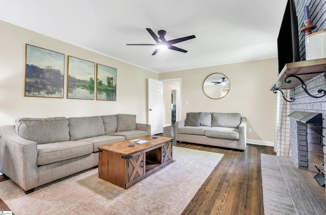101 Kenilworth Ct, Greenville, SC 29615 - living room with wood finished floors, a ceiling fan, a brick fireplace, baseboards, and ornamental molding