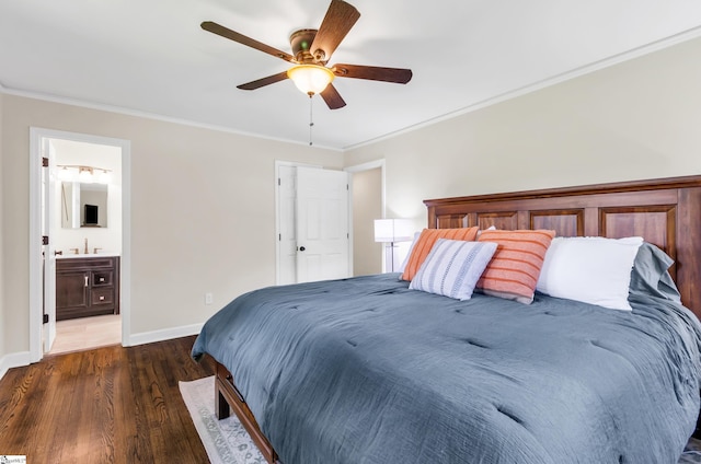 101 Kenilworth Ct, Greenville, SC 29615 - bedroom featuring ornamental molding, wood finished floors, a sink, baseboards, and ensuite bathroom