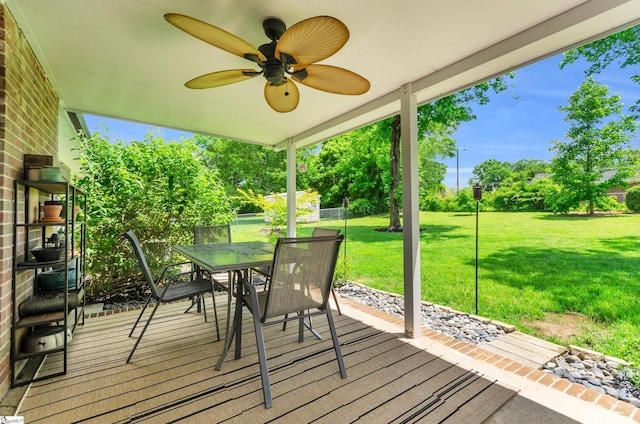 101 Kenilworth Ct, Greenville, SC 29615 - deck featuring a lawn, outdoor dining space, and a ceiling fan