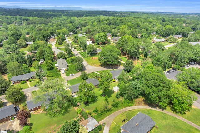 101 Kenilworth Ct, Greenville, SC 29615 - aerial perspective of suburban area featuring a heavily wooded area