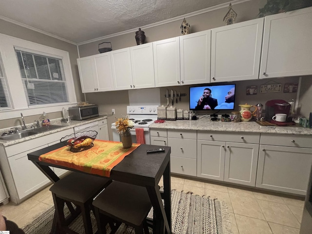 235 Brookwood Ter, Spartanburg, SC 29306 - kitchen with stainless steel microwave, white electric range, a sink, light countertops, and ornamental molding