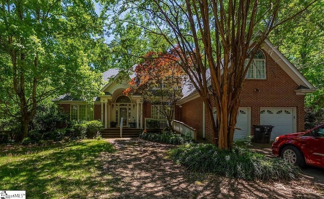 818 S Almond Dr, Simpsonville, SC 29681 - view of front of property with brick siding and a garage