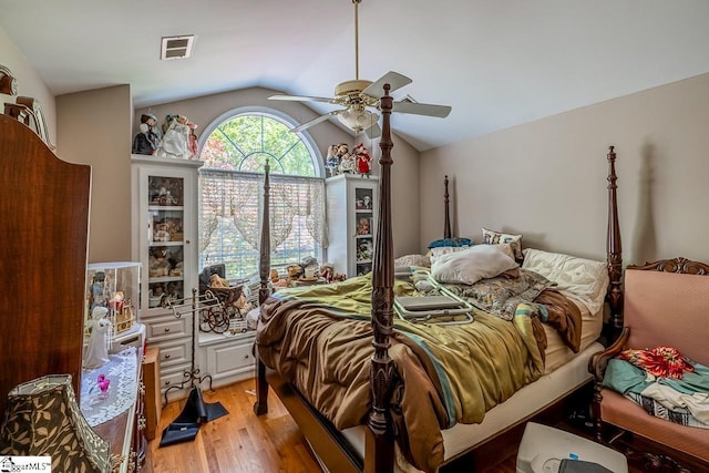 818 S Almond Dr, Simpsonville, SC 29681 - bedroom with light wood-type flooring, lofted ceiling, and ceiling fan