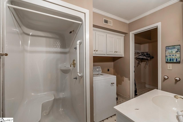 818 S Almond Dr, Simpsonville, SC 29681 - clothes washing area featuring washer / dryer, crown molding, cabinet space, and baseboards