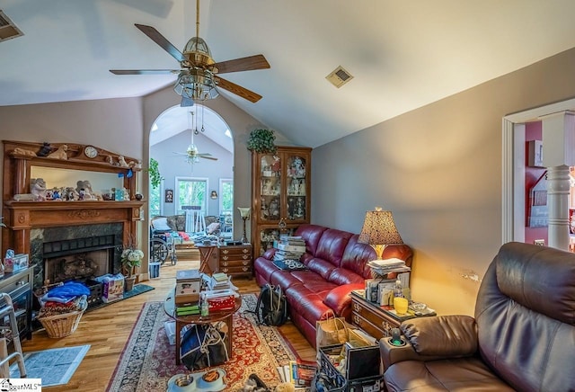 818 S Almond Dr, Simpsonville, SC 29681 - living area featuring ceiling fan, wood finished floors, vaulted ceiling, and a premium fireplace