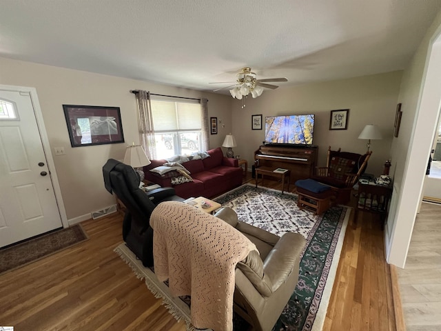10 Dickens Ln, Taylors, SC 29687 - living room featuring wood finished floors, a ceiling fan, and baseboards