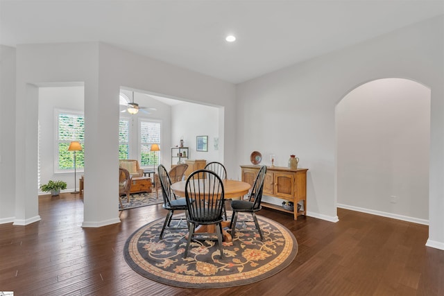 708 Emerald Hill Ct, Simpsonville, SC 29681 - dining space with arched walkways, ceiling fan, dark wood finished floors, baseboards, and recessed lighting