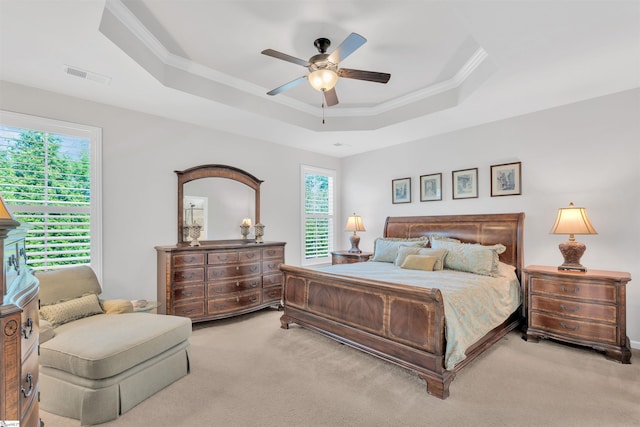 708 Emerald Hill Ct, Simpsonville, SC 29681 - carpeted bedroom with a tray ceiling, ornamental molding, and a ceiling fan