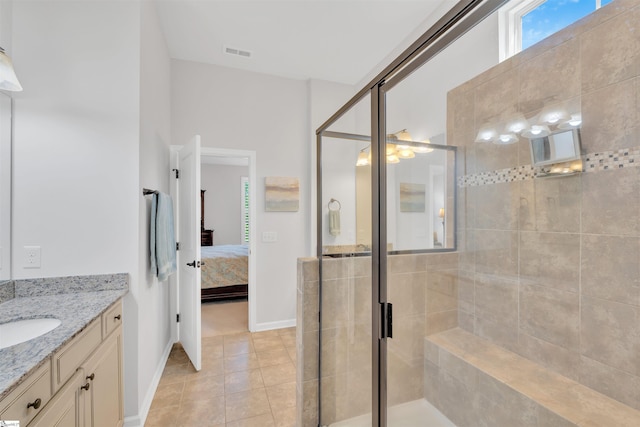 708 Emerald Hill Ct, Simpsonville, SC 29681 - ensuite bathroom with a stall shower, vanity, baseboards, and tile patterned floors