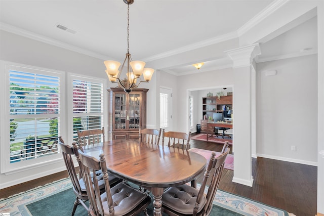 708 Emerald Hill Ct, Simpsonville, SC 29681 - dining room featuring ornamental molding, a chandelier, wood finished floors, and baseboards