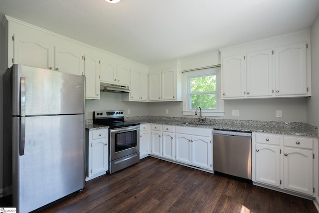 474 Lindsey Lake Rd, Travelers Rest, SC 29690 - kitchen with appliances with stainless steel finishes, under cabinet range hood, a sink, light stone counters, and dark wood finished floors